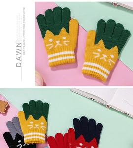 Detailed view of kids knitted winter gloves featuring cute cat jacquard and striped cuffs