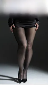 Detail of sheer black pantyhose with 4-track knitting for a smooth, uniform texture