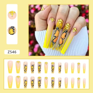 Uñas postizas largas ballerina con degradado amarillo, mariposas y cristales