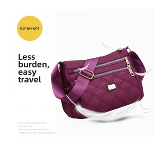 Detail of purple quilted nylon crossbody bag showing lightweight waterproof fabric texture