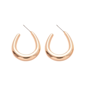 Polished rose gold U-shaped earrings with minimalist metallic finish and silver pins