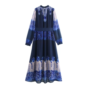 Elegant blue floral chiffon maxi dress with high neck, long sleeves, and waist tie belt
