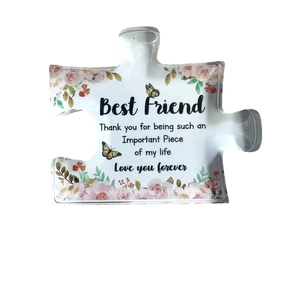 Clear acrylic puzzle ornament with floral patterns and Best Friend message