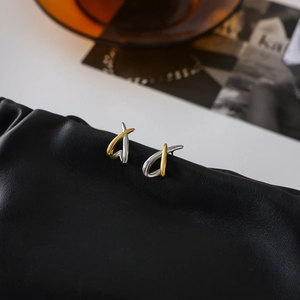 Classic two-tone twisted knot earrings in 18K gold and silver stainless steel