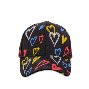 Close-up of black cotton baseball cap featuring colorful hand-drawn heart patterns