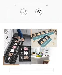 Detail of Nordic kitchen mat set featuring absorbent cat and bear patterns and non-slip texture