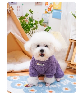 Detail of purple sherpa fleece pet jumpsuit with soft texture and Pet Partner logo