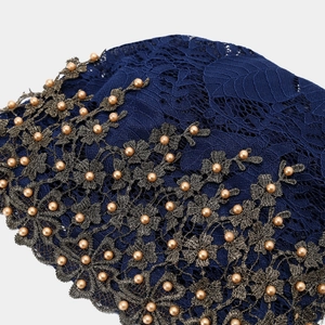 Turban ethnique en dentelle bleue avec broderie bronze et perles champagne