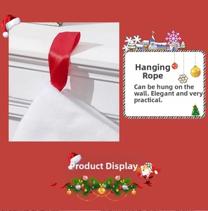Detail of red satin hanging loop on black and white plaid Christmas stocking