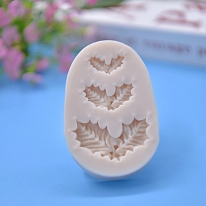 Christmas holly leaf silicone mold with detailed vein textures for DIY cake decorating