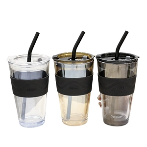 Three premium glass tumblers with straws, silicone sleeves and leak-proof lids in varied colors