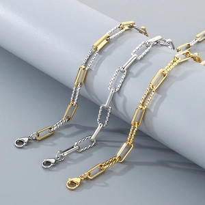Detailed view of adjustable stainless steel paperclip bracelets in gold and silver finishes
