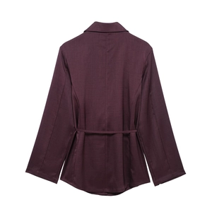 Rear view of a dark red satin blazer with a waist tie detail and a slim fit silhouette