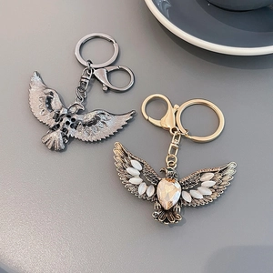 Retro eagle keychain with cat eye stone in silver and gold plating options