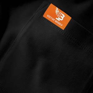 Close-up of black knit fabric texture with orange brand label and Doctor Muscle logo