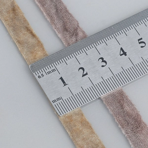 10mm double-sided velvet ribbon in beige and dusty pink shown with measuring ruler