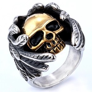 Bague tête de mort style punk avec ailes dorées et finition argentée vintage pour la mode
