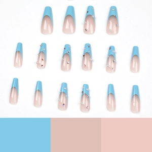 Blue French ballerina false nails with pearls and rhinestones on white background