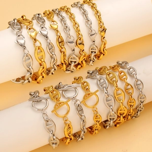 Gold and silver pig nose link chain bracelets with OT toggle and lobster clasps