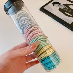 High-elastic macaron colored hair ties set in a transparent storage tube for daily styling