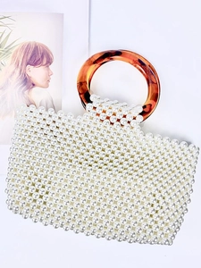 Handmade pearl beaded handbag with amber resin ring handles for minimalist summer fashion