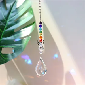Detail of crystal suncatcher with rainbow beads and multifaceted teardrop prism