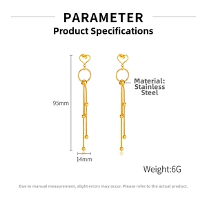 Detail view of 95mm gold-plated stainless steel tassel earrings with heart studs