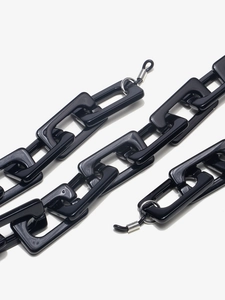 Detail view of large link acrylic glasses chain with silver metal ring and silicone connector