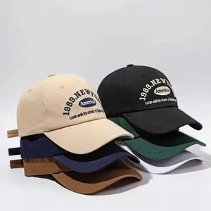 Detail of multi-color cotton baseball caps with 1989 New York vintage embroidery