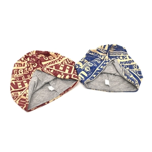 Set of two hip-hop slouchy beanies with vintage newspaper print and gray lining