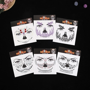 Set of six Day of the Dead face jewels with colorful rhinestone skull designs