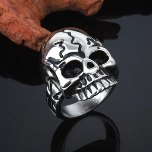 Macro shot showing detailed mummy skull design on silver stainless steel ring