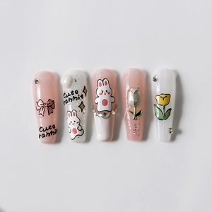 Cute rabbit and tulip press-on nails with 3D resin charms and sparkling rhinestones
