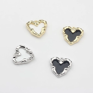 Golden and silver alloy heart pendants in hollow and black inlay styles for DIY jewelry