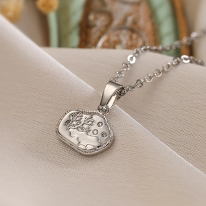 Minimalist silver irregular geometric pendant necklace with deer and tree embossed design