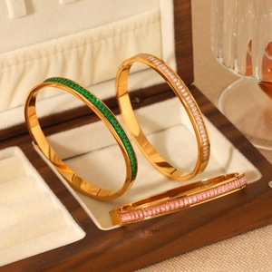 18K gold plated stainless steel bangles with colorful zircon inlays in a wooden gift box