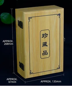 Detailed view of rectangular bamboo storage box with vintage metal clasp and engraving