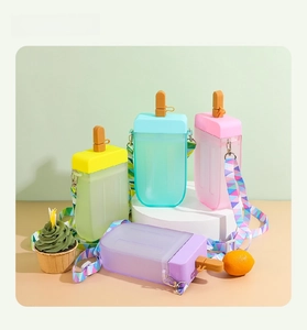 Macro shot of colorful popsicle-shaped water bottles with adjustable patterned straps