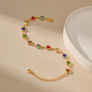 Colorful heart gemstone bracelet with gold chain and adjustable lobster clasp closure