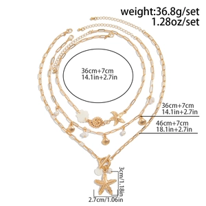 Detailed size chart showing gold starfish and seashell necklace set dimensions and weight