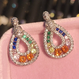 Rainbow teardrop earrings with colorful tourmaline stones in a pink velvet jewelry box