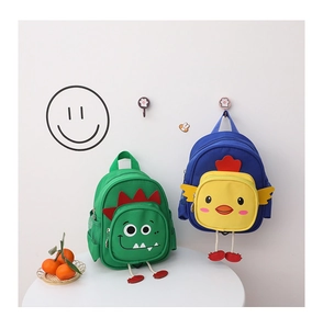 Detail of cute cartoon animal canvas backpacks for kids in green and blue colors