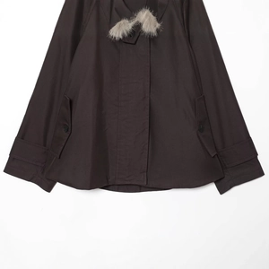 Women's dark brown waterproof parka with grey faux fur collar and buckle sleeve details