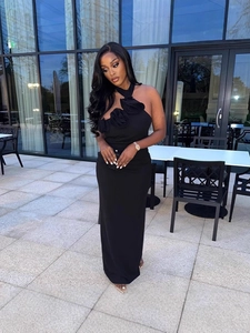 Elegant black halter maxi dress with 3D floral accent and sexy open-back split for women