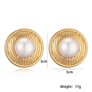 Detailed view of 18K gold plated heart earrings with 3cm size and 17g weight specs