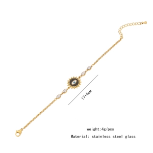Detailed view of evil eye sun charm bracelet with 17+4cm length and 4g weight specs