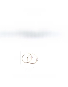 Detail view showing gold-plated hoop earrings with imitation pearls and 4.5cm diameter size