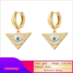 Gold-plated brass evil eye drop earrings with blue and white zircon stones in triangle shape