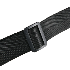 Detail of durable black nylon shoulder strap with adjustable plastic buckle for waist bags