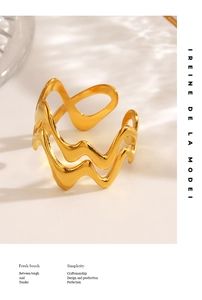 Macro shot of 18K gold plated stainless steel ring with double layer wave design
